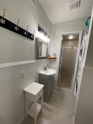 Shower, towels, soap, shampoo