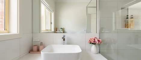 Shower, hair dryer, towels, soap