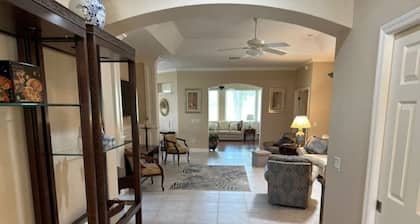 Beautiful home on golf course w/ unheated lap pool! Dogs are ok!