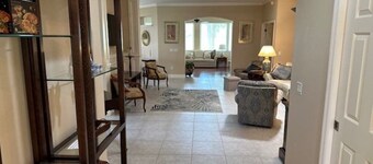 Beautiful home on golf course w/ unheated lap pool! Dogs are ok!