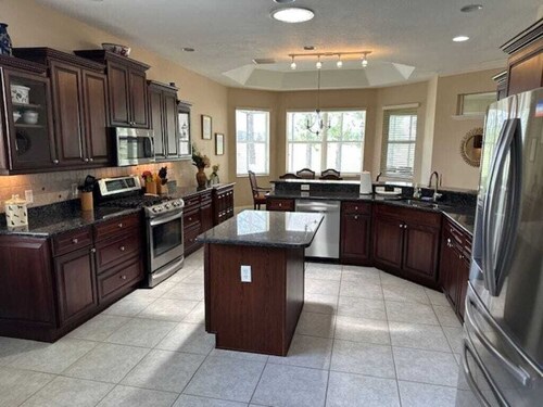 Beautiful home on golf course w/ unheated lap pool! Dogs are ok!