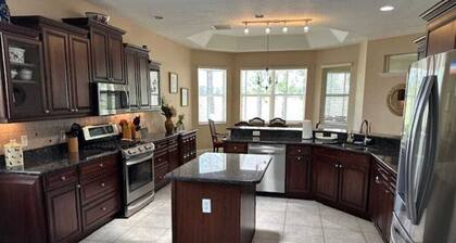 Beautiful home on golf course w/ unheated lap pool! Dogs are ok!