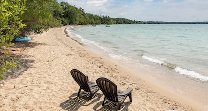 Updated Leelanau home nestled bt Suttons Bay & West Bay, 3 min walk to 2 beaches