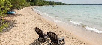 Updated Leelanau home nestled bt Suttons Bay & West Bay, 3 min walk to 2 beaches