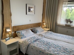 1 habitación, tabla de planchar con plancha, wifi gratis y ropa de cama 