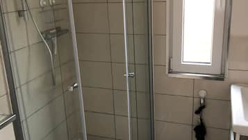 Shower, free toiletries, hair dryer, towels