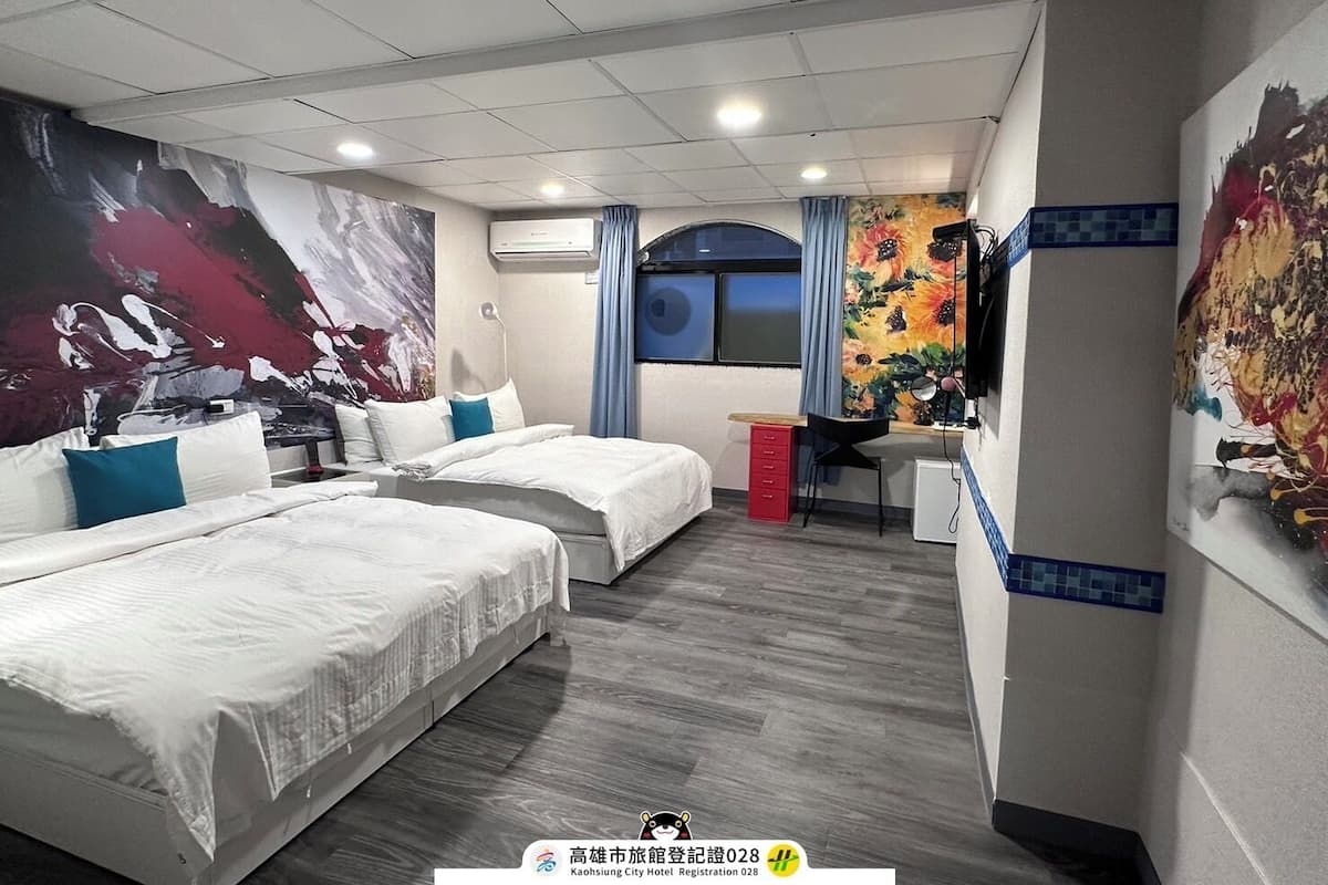 Deluxe Quadruple Room, 2 Double Beds | 1 bedroom, down comforters, individually decorated, desk