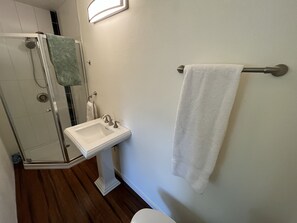 Shower, hair dryer, towels, soap