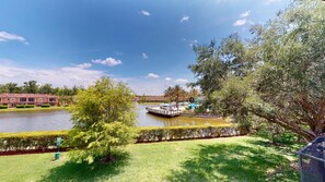 Guests can enjoy serene views of the river and surrounding landscape from this tranquil outdoor setting.