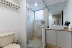 Shower, hair dryer, towels, soap