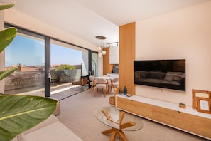 Apartment | Living area | 81-cm flat-screen TV with cable channels, TV