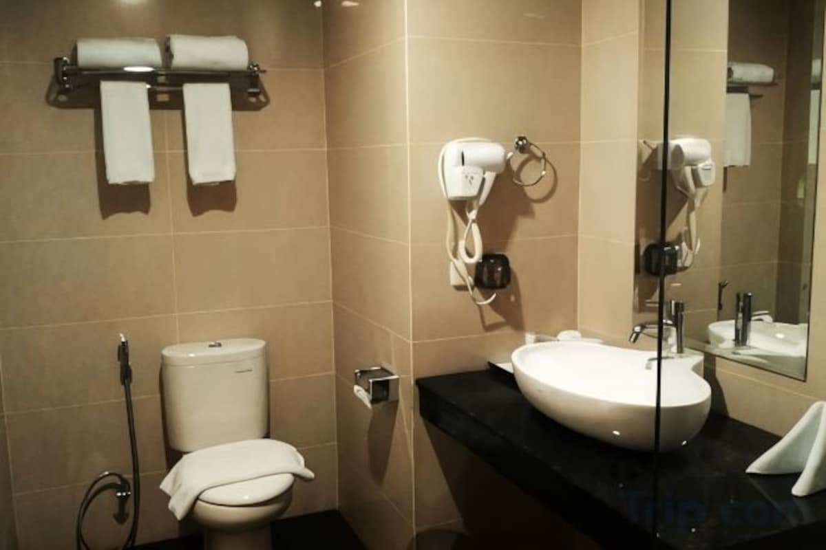 Hair dryer, slippers, bidet, towels