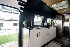Fridge, microwave, coffee/tea maker, toaster - Chic & Modern Airstream + Soaking Tub (Desert Hot Springs)