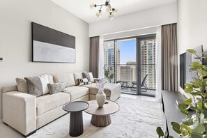 Apartment (Burj Royale 2108) | Living area | 50-inch Smart TV with digital channels - Silkhaus Burj Royale, Downtown Dubai (Dubai)