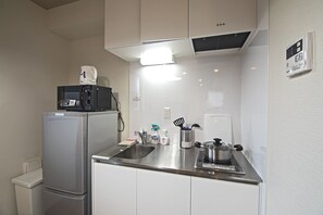 Classic Quadruple Room | Private kitchen