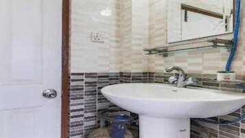 Shower, rainfall showerhead, towels, soap