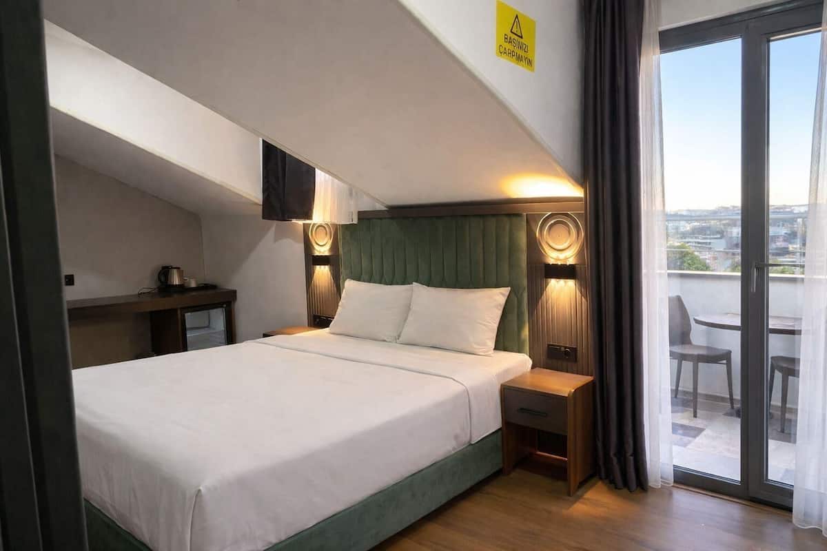 Deluxe Double Room with Balcony | Premium bedding, down comforters, minibar, in-room safe