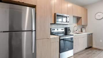 Apartemen | Dapur pribadi | Lemari es, microwave, oven, dan mesin pencuci piring