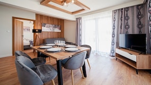 Apartment (J3) | Living area | Flat-screen TV - Sun & Snow Resorts J Białka Tatrzańska (Bukowina Tatrzanska)