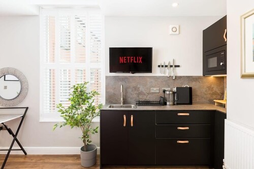 First floor compact studio with kitchenette