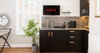 First floor compact studio with kitchenette