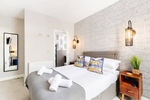 1 bedroom, desk, iron/ironing board, travel cot