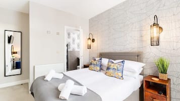 1 bedroom, desk, iron/ironing board, travel crib