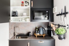 Fridge, microwave, stovetop, toaster - Second floor compact studio with mini kitchen (Warrington)