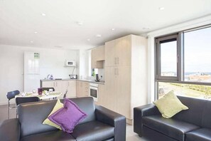 Chambre Standard double | Aire de séjour