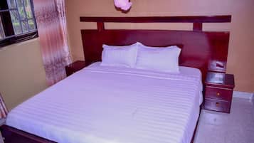 Deluxe-sviitti, 1 makuuhuone | 1 makuuhuone, ilmainen Wi-Fi, vuodevaatteet