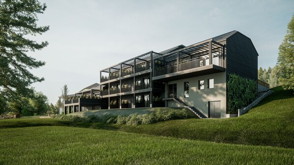 A modern multi-story building with a flat roof, large windows, and balconies. - Roompot Hillview Resort Grandvoir (Neufchateau)