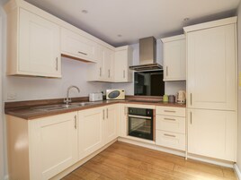 Fridge, electric kettle, toaster, cookware/dishes/utensils