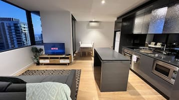 City Apartment | Living area | 42-inch LED TV with cable channels, TV