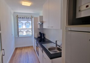 Căn hộ tiện nghi đơn giản | Bếp riêng