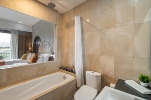 Premium Room, Balcony | Bathroom | Separate tub and shower, rainfall showerhead, towels - Cove Tevana (Seminyak)