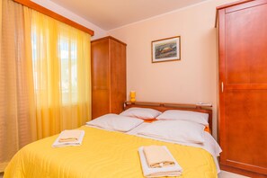 1 bedroom, desk, iron/ironing board, travel cot