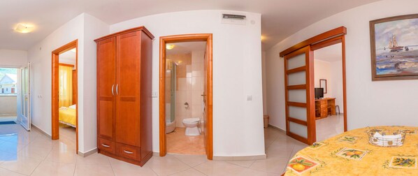 1 bedroom, desk, iron/ironing board, travel cot