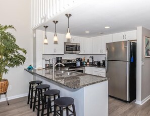 Fridge, microwave, oven, stovetop - The Sunny Surf - Top Floor Surf Condo - 2 BRs, 2 BA! (Surf City)