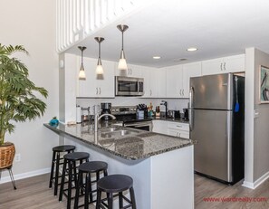 Fridge, microwave, oven, stovetop - The Sunny Surf - Top Floor Surf Condo - 2 BRs, 2 BA! (Surf City)