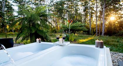 Dorrigo accommodation, twin outdoor baths under the stars,120 ac. river & walks