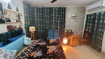 Deluxe Quadruple Room | 1 bedroom, in-room safe, iron/ironing board, free WiFi