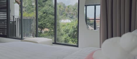 Deluxe Quadruple Room | Premium bedding, down comforters, individually decorated