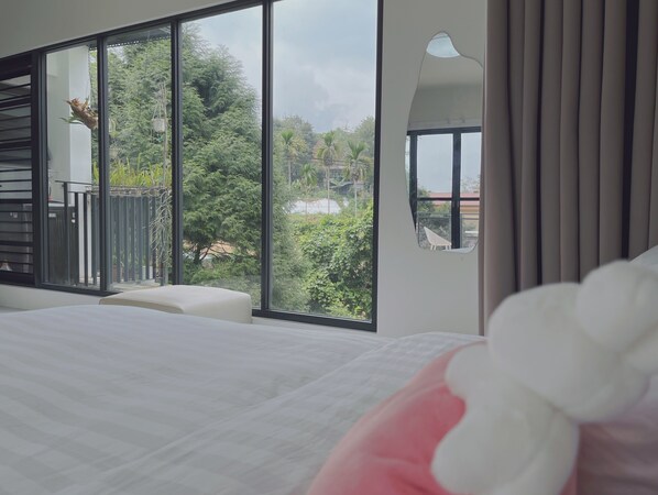 Habitación cuádruple Deluxe | 1 dormitorio, ropa de cama de alta calidad, edredones de plumas