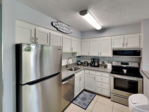 Fridge, microwave, oven, stovetop - Endless Summer #A27 | Gulf Side Condo, Near Beach + Pool (Panama City Beach)
