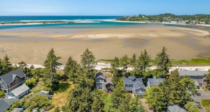 Walk to the sand and enjoy incredible views from this beach front home!