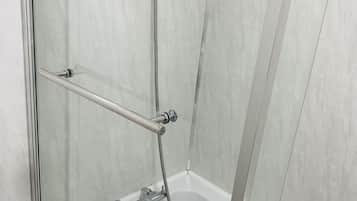 House, Multiple Beds | Bathroom | Combined shower/bathtub, deep-soaking bathtub, hair dryer, towels