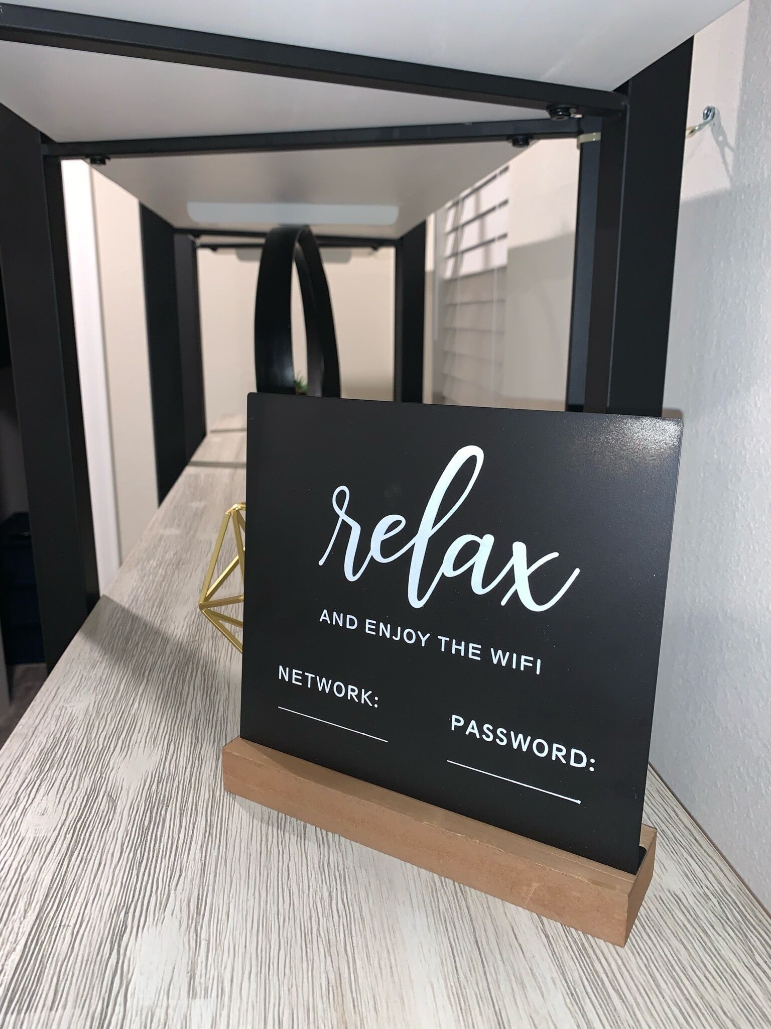 A sign with the word "relax" and instructions for enjoying the wifi.