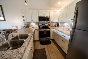 Fridge, microwave, oven, stovetop - Sweet Maui Kamaole I217 2brm/2bath Executive Vacation Home - (Kihei)