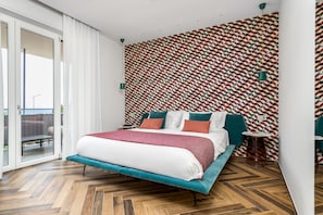 Exclusive Apartment | 1 bedroom, down comforters, in-room safe, blackout drapes