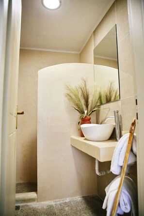 Shower, hair dryer, towels, toilet paper